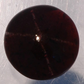 Granate estrella negro natural de 4,36 ct, corte redondo, translúcido