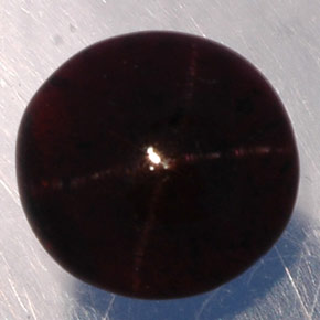 Granate estrella negro natural de 4,36 ct, corte redondo, translúcido