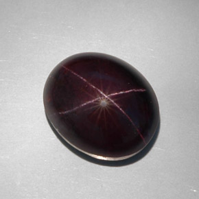 Granate estrella negro natural de 34,12 ct, corte óvalo, opaco