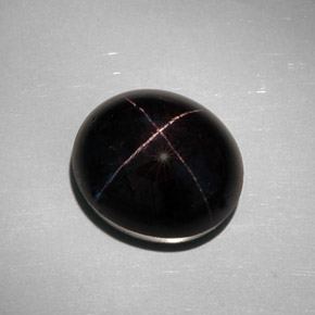 Granate estrella negro natural de 35,68 ct, corte óvalo, opaco