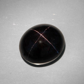 Granate estrella negro natural de 35,68 ct, corte óvalo, opaco