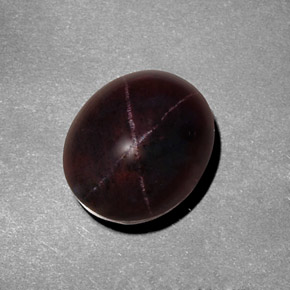 Granate estrella rojo natural de 9,49 ct, corte óvalo, opaco