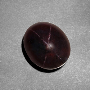 Granate estrella rojo natural de 9,49 ct, corte óvalo, opaco