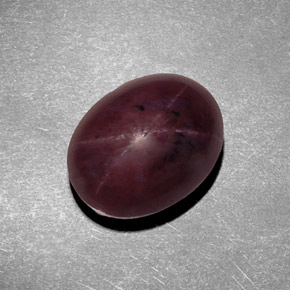 Granate estrella rojo natural de 9,38 ct, corte óvalo, opaco