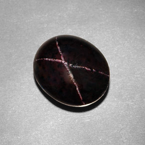 Granate estrella negro natural de 9,54 ct, corte óvalo, opaco