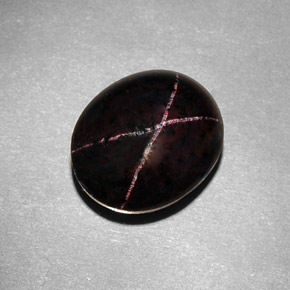 Granate estrella negro natural de 9,54 ct, corte óvalo, opaco