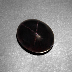 Granate estrella negro natural de 7,21 ct, corte óvalo, opaco