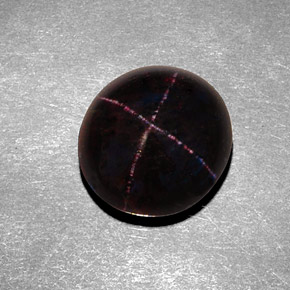 Granate estrella negro natural de 8,43 ct, corte óvalo, opaco