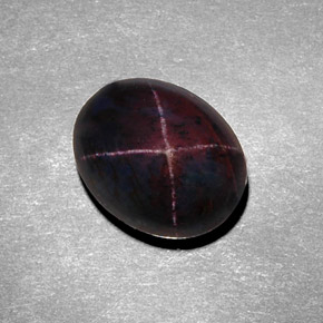 Granate estrella negro natural de 8,98 ct, corte óvalo, opaco