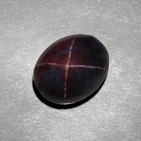 Granate estrella negro natural de 8,98 ct, corte óvalo, opaco