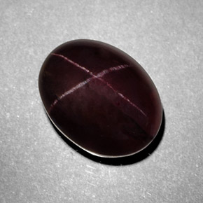 Granate estrella rojo natural de 9,76 ct, corte óvalo, opaco