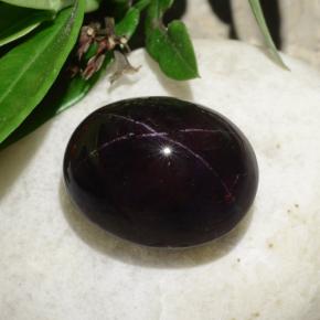 Granate estrella negro natural de 31,18 ct, corte óvalo, opaco