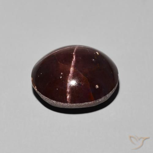 Granate estrella Rojo oscuro natural de 10.16 ct, Ovalada, Opaco