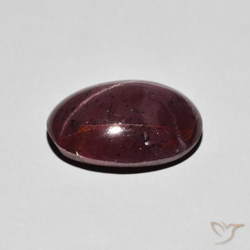 Granate estrella Rojo oscuro natural de 7.23 ct, Ovalada, Opaco