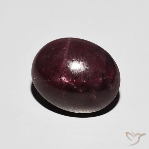 Granate estrella Rojo oscuro natural de 8.98 ct, Ovalada, Opaco