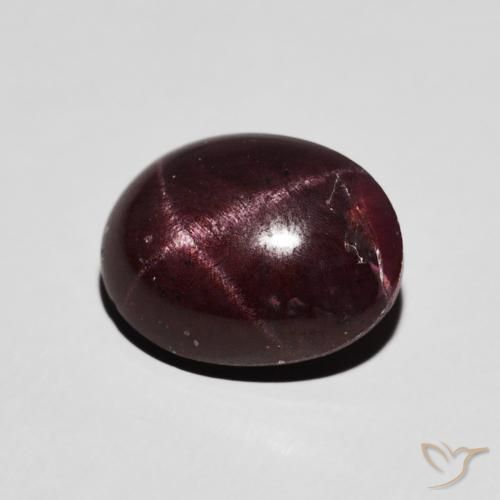 Granate estrella Rojo oscuro natural de 6.48 ct, Ovalada, Opaco