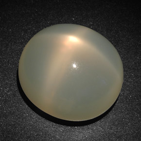 Piedra de luna estrella crema natural de 22,83 ct, corte óvalo, translúcido