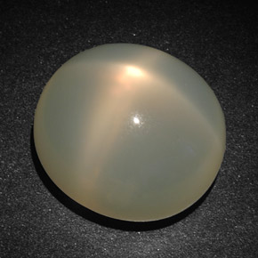 Piedra de luna estrella crema natural de 22,83 ct, corte óvalo, translúcido