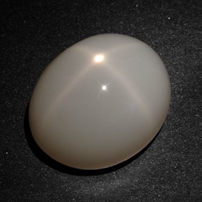 Piedra de luna estrella crema natural de 22,77 ct, corte óvalo, translúcido
