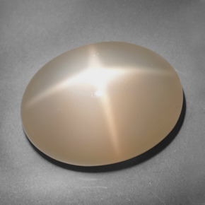 Piedra de luna estrella naranja natural de 25,39 ct, corte óvalo, translúcido