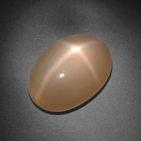 Piedra de luna estrella naranja natural de 8,01 ct, corte óvalo, translúcido