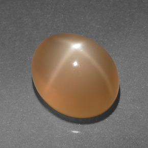 Piedra de luna estrella naranja natural de 4,95 ct, corte óvalo, translúcido