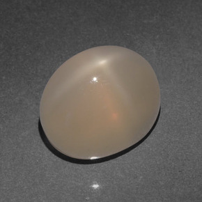 Piedra de luna estrella naranja natural de 4,66 ct, corte óvalo, translúcido