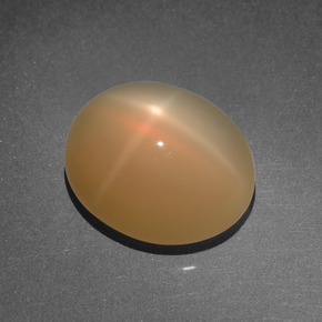 Piedra de luna estrella naranja natural de 8,03 ct, corte óvalo, translúcido