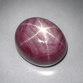 Rubí estrella rojo natural de 28,59 ct, corte óvalo, opaco