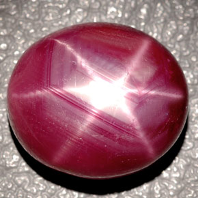Rubí estrella rojo natural de 24,37 ct, corte óvalo, opaco