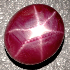 Rubí estrella rojo natural de 24,37 ct, corte óvalo, opaco