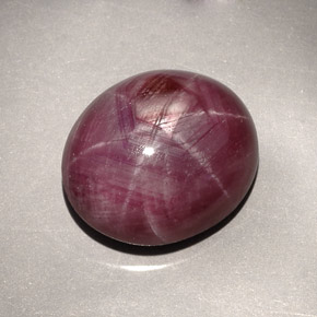 Rubí estrella rojo natural de 27,30 ct, corte óvalo, opaco
