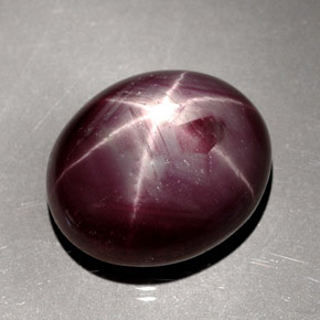Rubí estrella rojo natural de 24,48 ct, corte óvalo, opaco