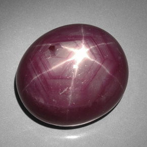 Rubí estrella rojo natural de 50,61 ct, corte óvalo, opaco