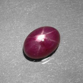 Rubí estrella rojo natural de 1,80 ct, corte óvalo, opaco