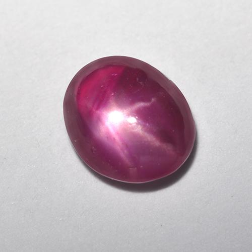 Rubí estrella rojo natural de 0,64 ct, corte óvalo, translúcido