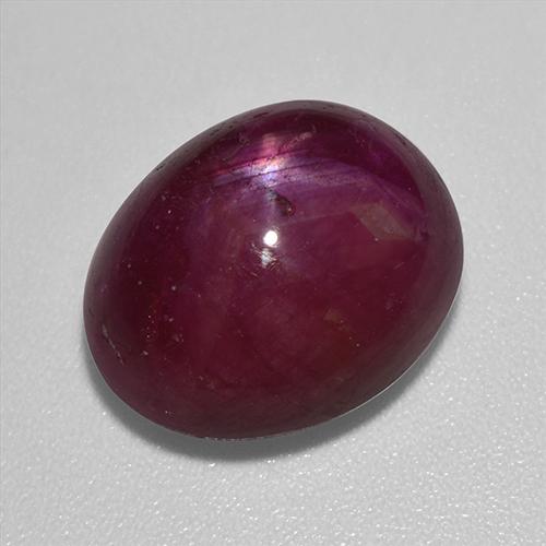 Rubí estrella rojo natural de 12,01 ct, corte óvalo, opaco