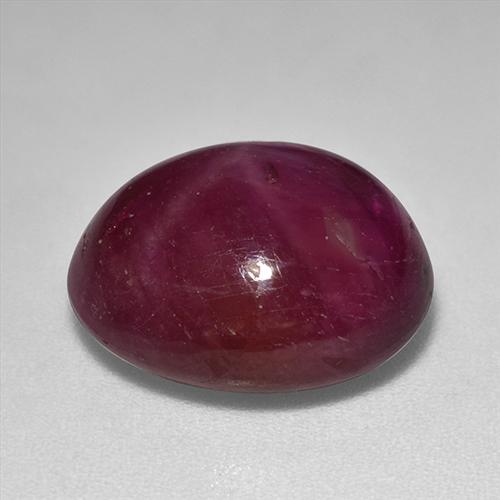Rubí estrella rojo natural de 12,01 ct, corte óvalo, opaco