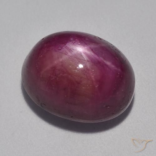 rubí estrella Púrpura oscuro medio natural de 12.53 ct, Ovalada, Opaco