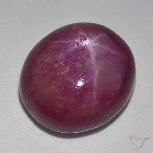 rubí estrella Púrpura oscuro medio natural de 21.95 ct, Ovalada, Opaco