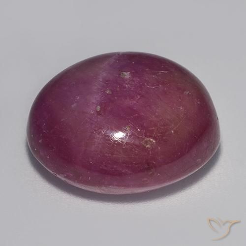 rubí estrella Púrpura oscuro medio natural de 21.95 ct, Ovalada, Opaco