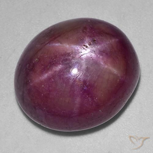 Rubí estrella púrpura oscuro medio natural de 19,78 ct, corte óvalo, opaco