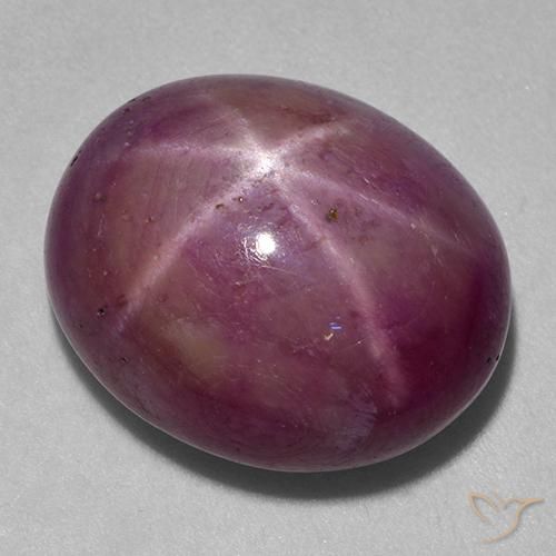 rubí estrella Magenta grisáceo natural de 25.16 ct, Ovalada, Opaco