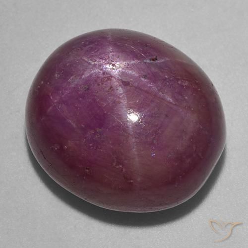 rubí estrella Púrpura oscuro medio natural de 24.49 ct, Ovalada, Opaco
