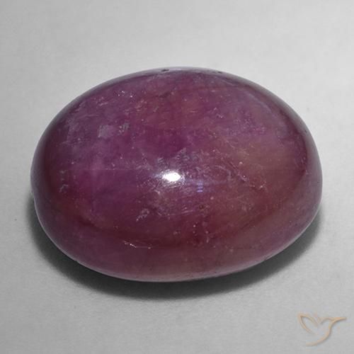 rubí estrella Púrpura oscuro medio natural de 24.49 ct, Ovalada, Opaco