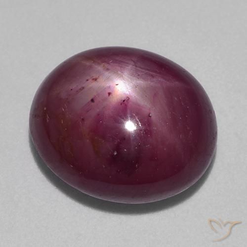 rubí estrella Púrpura oscuro medio natural de 10.15 ct, Ovalada, Opaco