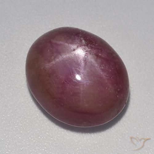 rubí estrella Púrpura oscuro medio natural de 9.31 ct, Ovalada, Opaco
