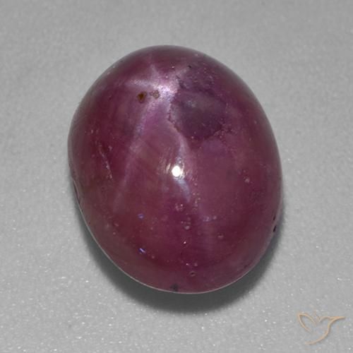rubí estrella Púrpura oscuro medio natural de 7.59 ct, Ovalada, Opaco