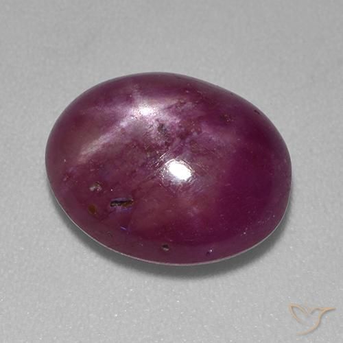 rubí estrella Púrpura oscuro medio natural de 6.43 ct, Ovalada, Opaco