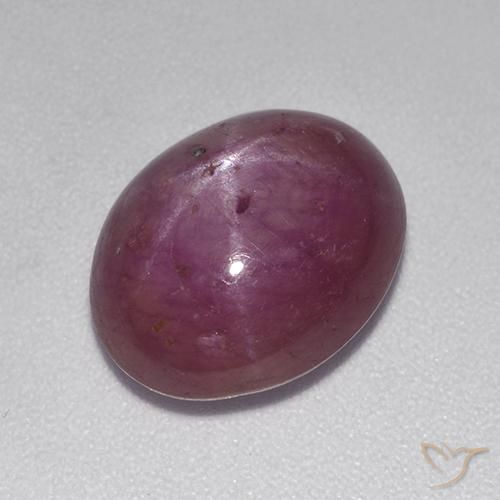 rubí estrella Púrpura oscuro medio natural de 6.80 ct, Ovalada, Opaco